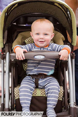 Street portrait of an happy baby