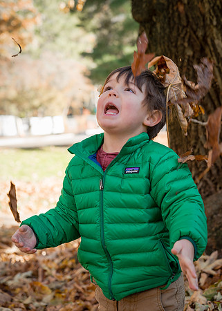 Autumn play - outdoor kid's portrait